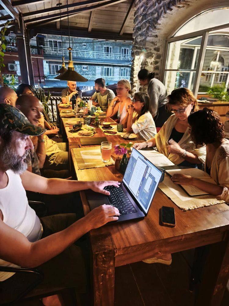 Guests at a long dinner table